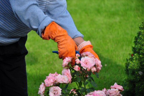 Volunteers loading reusable garden items for charity collection